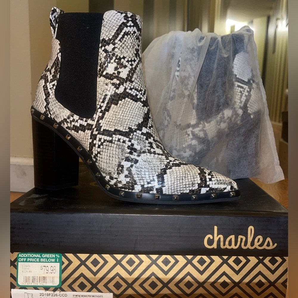 Studded Snake Print ankle boots.
